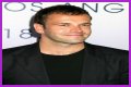 Jonny Lee Miller flashes ink for Ellen charity